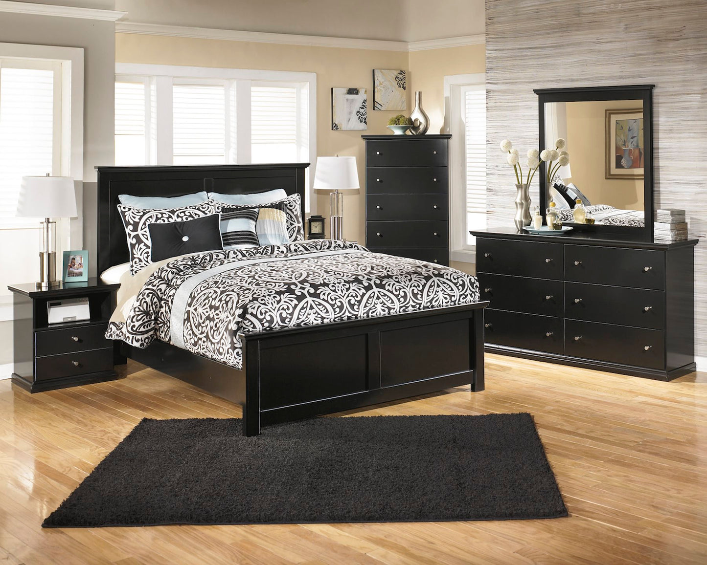 Ashley Maribel 6 PC Queen Panel Bedroom Set with Two Nightstand & Chest in Black - The Furniture Space.