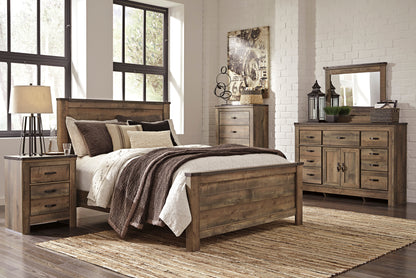 Ashley Trinell 4PC Bedroom Set E King Panel Bed One Nightstand Dresser Mirror in Brown