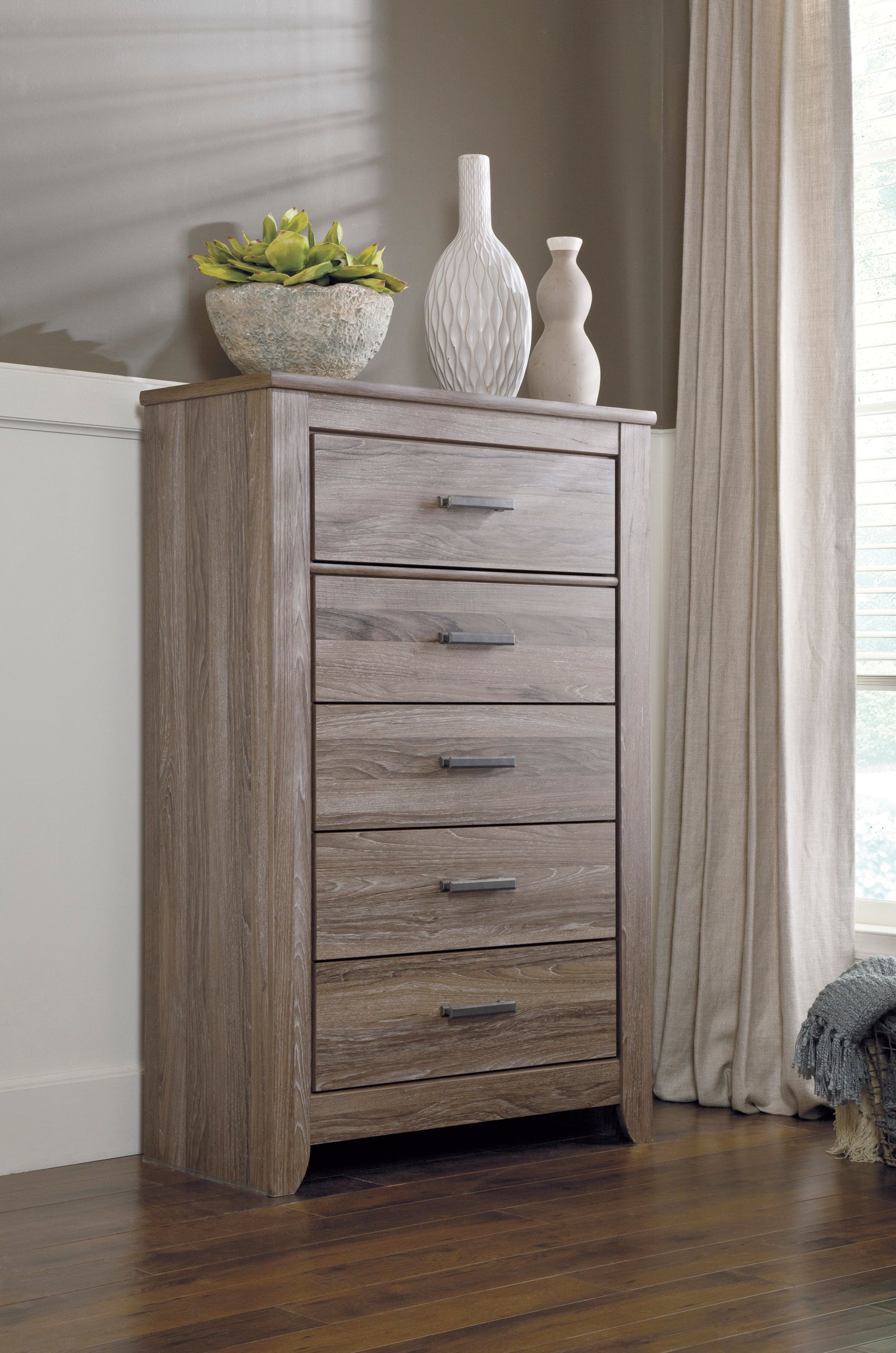 Ashley Zelen Five Drawer Chest In Warm Gray