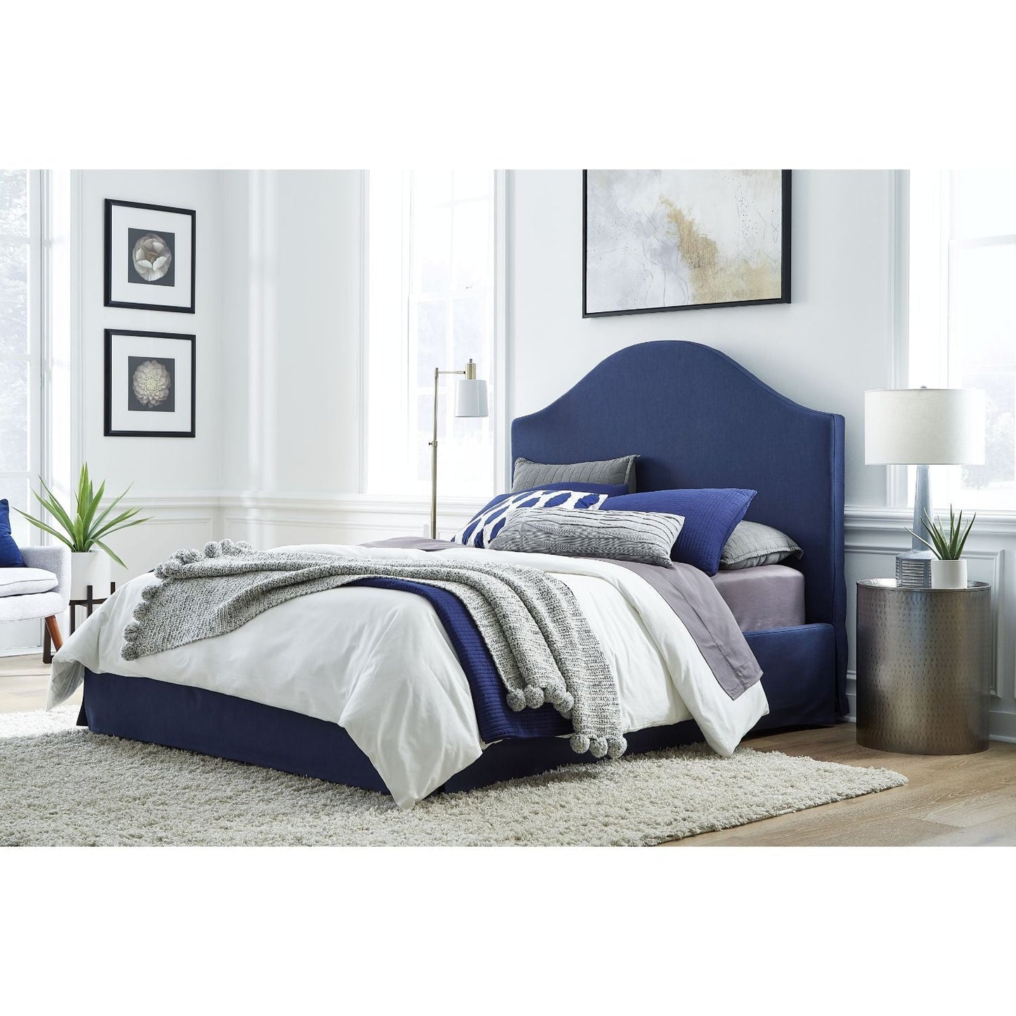 Modus Sur King Upholstered Skirted Storage Panel Bed in Navy