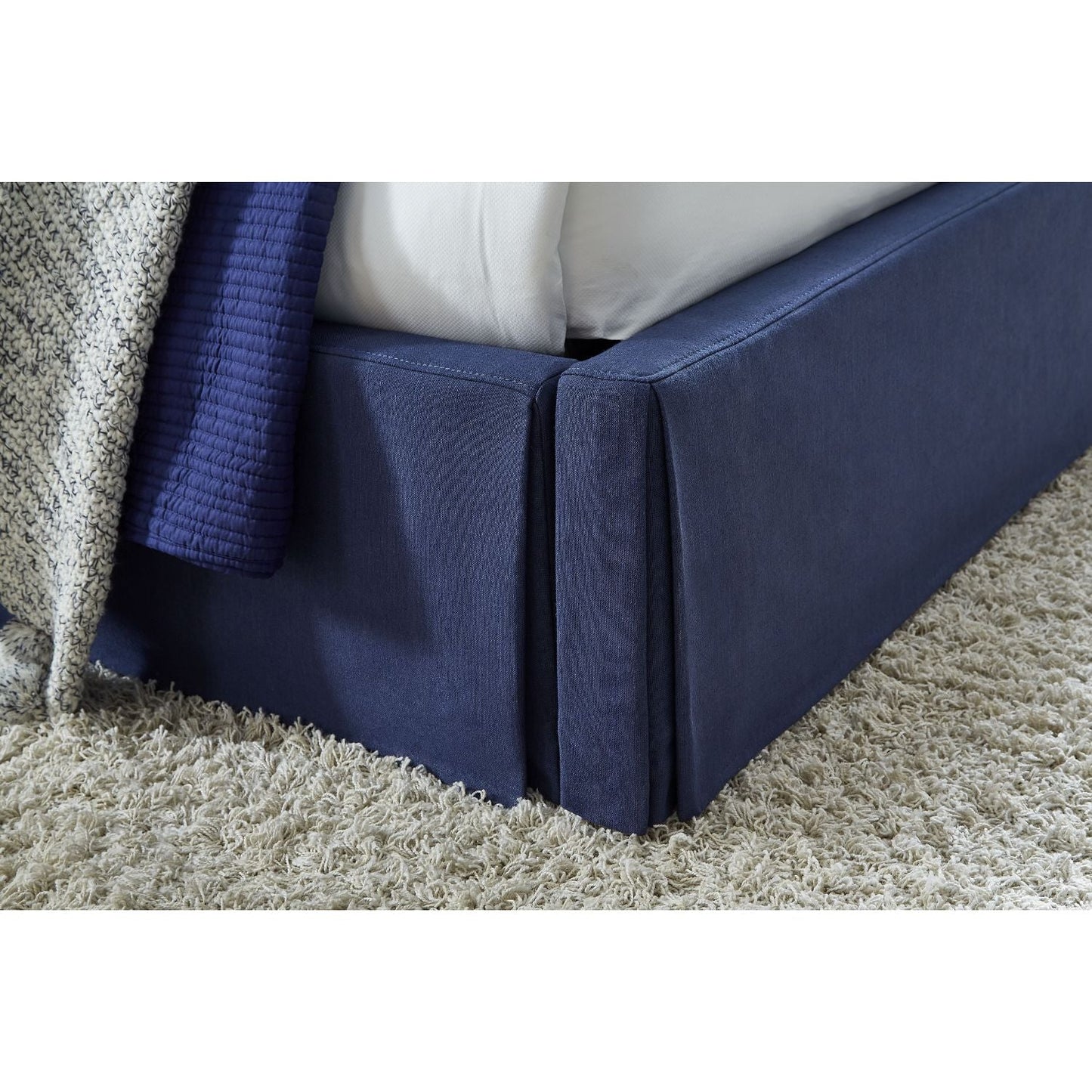 Modus Sur King Upholstered Skirted Storage Panel Bed in Navy