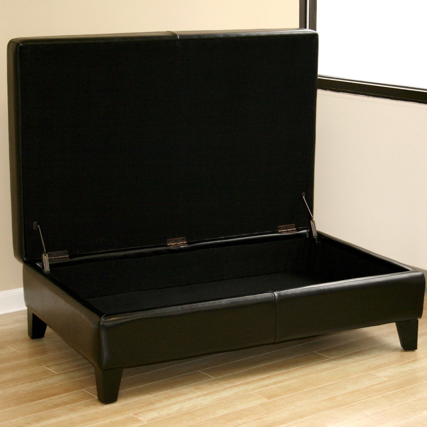 Contemporary Storage Cocktail Ottoman in Black Leather