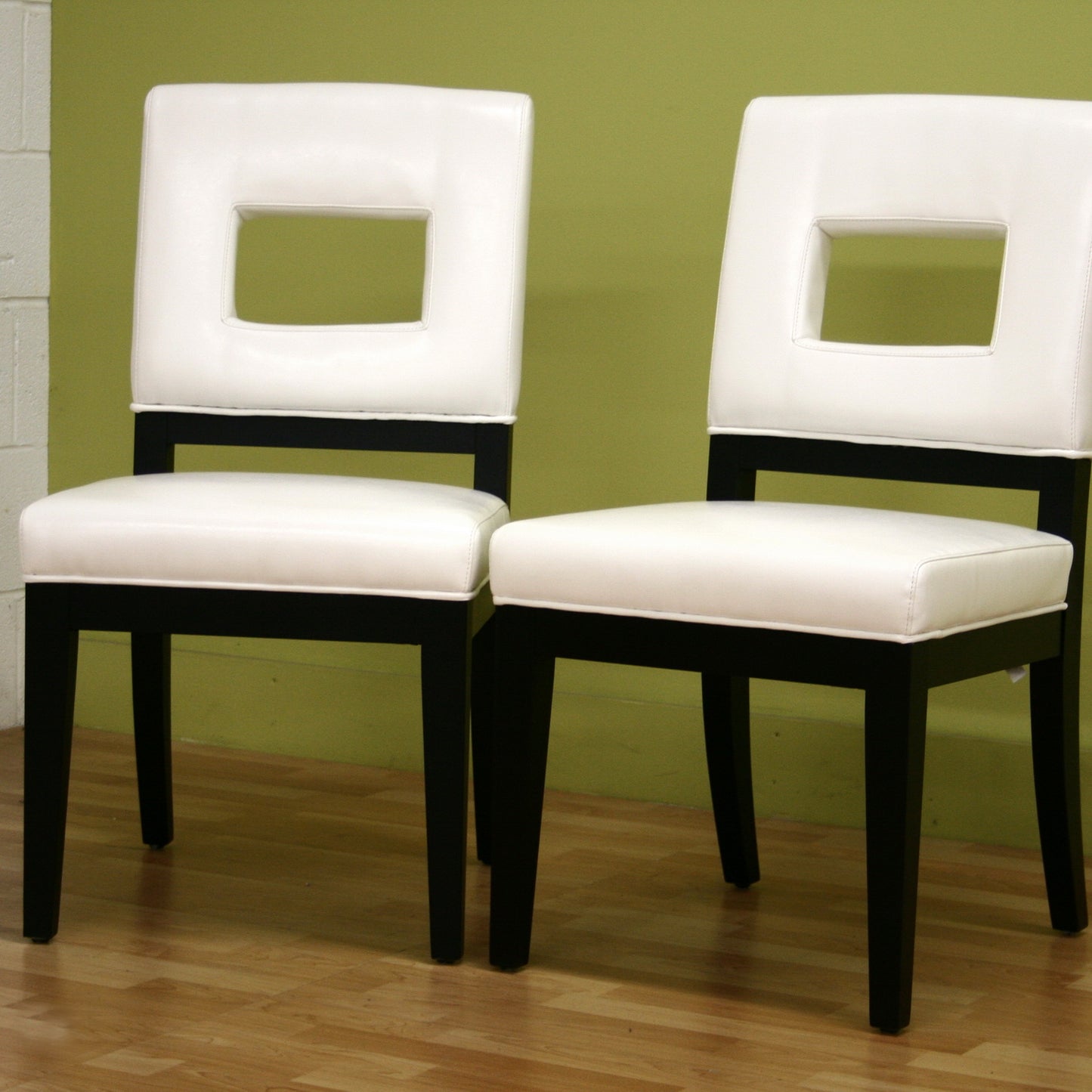 Contemporary 2 Dining Chairs in White Bycast Leather - The Furniture Space.
